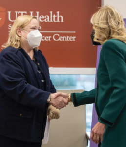 Breast cancer survivor Cynthia Orrmeets first lady Jill Biden.
