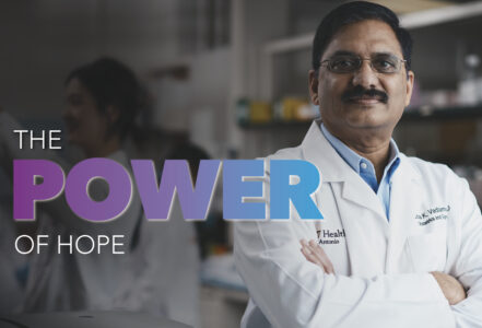 Dr. Vadlamudi stands in front of his lab. The Power of Hope.