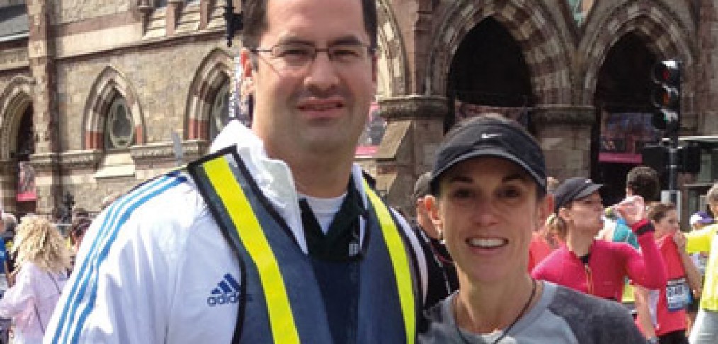 Alumnus Jorge A. Alvarez, M.D., congratulates his wife, Rebecca, after she crosses the Boston Marathon finish line. Despite the shock of the tragedy that occurred thereafter, Dr. Alvarez took immediate action to help the injured.