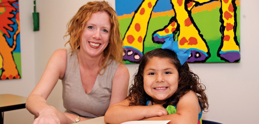 woman and young girl in classroom setting
