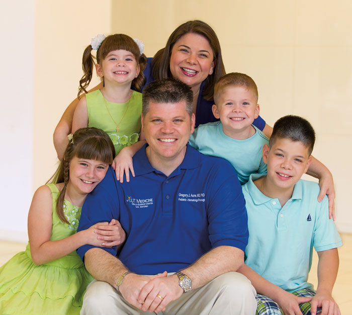 Gregory Aune, M.D., Ph.D., is pictured with his wife, Christine Aune, M.D., and his children: 10-year-old twins Emma and Noah (seated) and 5-year-old twins Sophia and Elijah (standing).