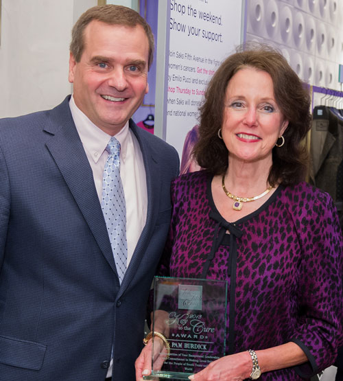 Steve Weitman, M.D., Ph.D., director of the Institute for Drug Development at the CTRC, congratulates Pam Burdick, president of the Cancer Center Council