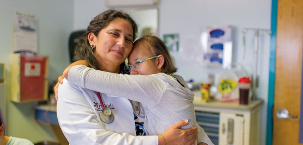Dr. Shah hugs Samantha Alvarez