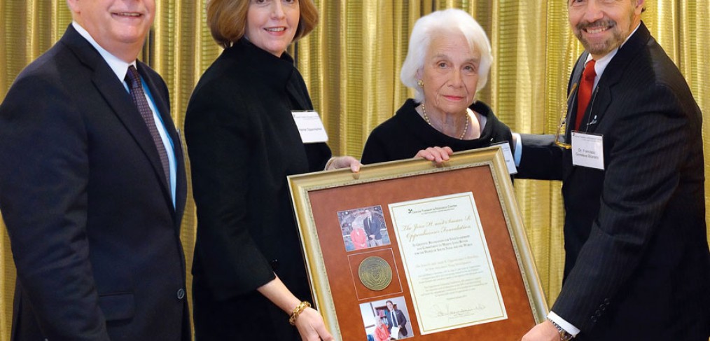 (Pictured above) Francisco González-Scarano, M.D., dean of the Long School of Medicine and vice president for medical affairs (right), presents Susan R. Oppenheimer (center) with a plaque of appreciation for her dedicated support.