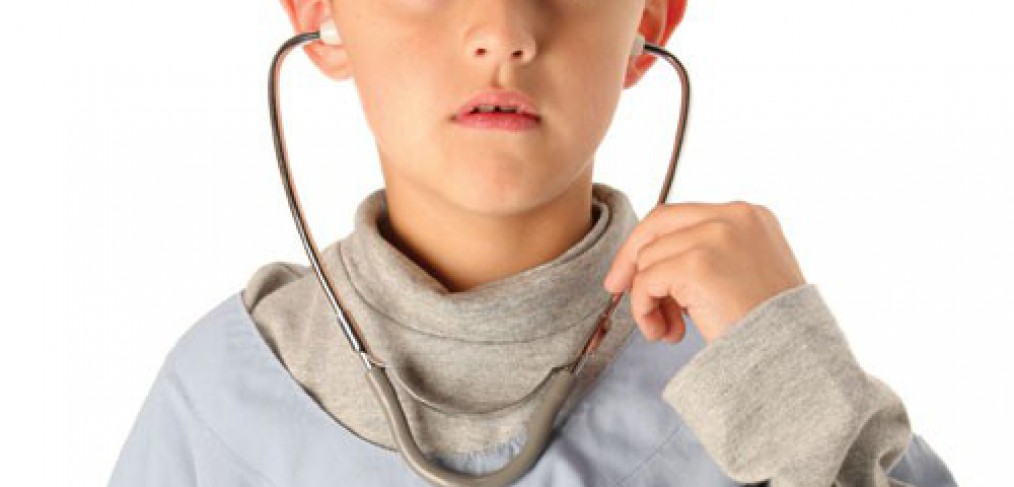 Boy playing with stethoscope