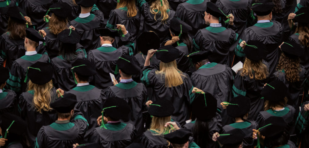 graduates at commencement