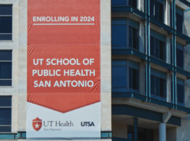picture of building with banner announcing UT School of Public Health San Antonio.