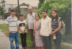 Two days before leaving Nepal, 12-year-old Chandra Subedi, second from left, was photographed with his older brother, Dhirendra Subedi, far left, his father Ram Subedi, his mother Dwarika Subedi, his cousin Somu Timsin and his sister Rupa Subedi, outside of the International Organization for Migration office in Damak, located in the Jhapa District in eastern Nepal, approximately 10 miles from the refugee camps. Today, Subedi and his siblings have flourishing careers. His eldest brother Deeprose Subedi, who arrived in the U.S. earlier than his family, and his middle brother Dhirendra Subedi, both hold electrical engineering degrees. Deeprose Subedi works for a patent company and Dhirendra Subedi works for a rail transport company. Subedi’s sister, Rupa Subedi, earned her Registered Nursing degree and works for a hospice company. Subedi’s cousin, Somu Timsina (second from right), resettled in Vermont with his family one or two months after Chandra Subedi’s family relocated to San Antonio.