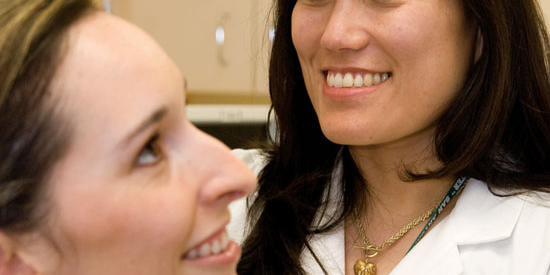 Dr. Osswald examines a patient at the UT Health San Antonio Dermatology Clinic. Photo by Rocelyn Aala Dunston