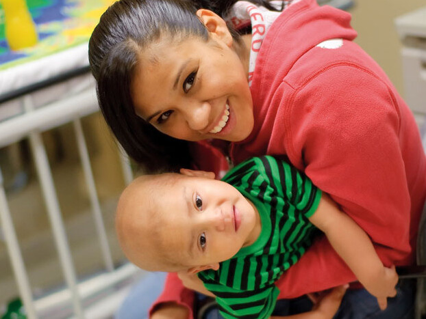 Sierra Garza enjoys a quiet moment with her 22 -month-old son, Haistin Sky, as he wakes up after his leukemia treatment at the CTRC.
