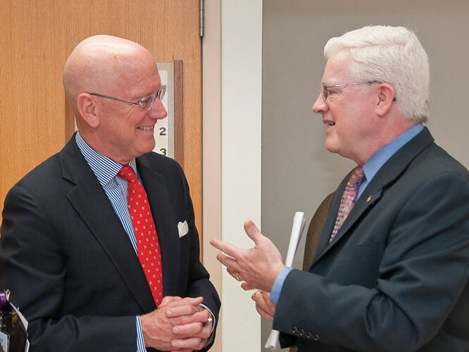 Dr. Henrich thanks Kevin C. Moriarty (right), president and chief executive officer of Methodist Healthcare Ministries