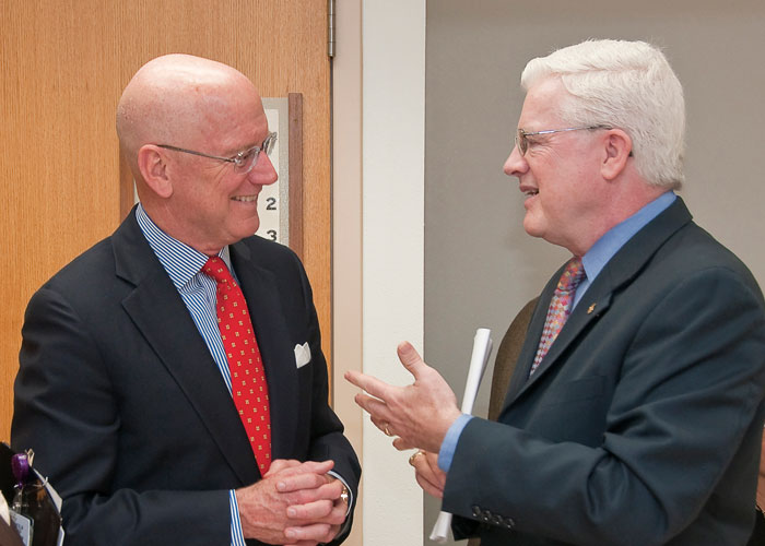 Dr. Henrich thanks Kevin C. Moriarty (right), president and chief executive officer of Methodist Healthcare Ministries
