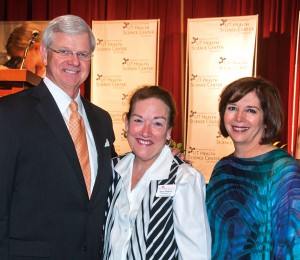 (Left to right) Nursing Advisory Committee Chair Gregg Muenster stands with keynote speaker Maria Wellisch, RN, B.B.A., LNFA, and School of Nursing Dean Eileen T. Breslin, Ph.D., RN, FAAN.