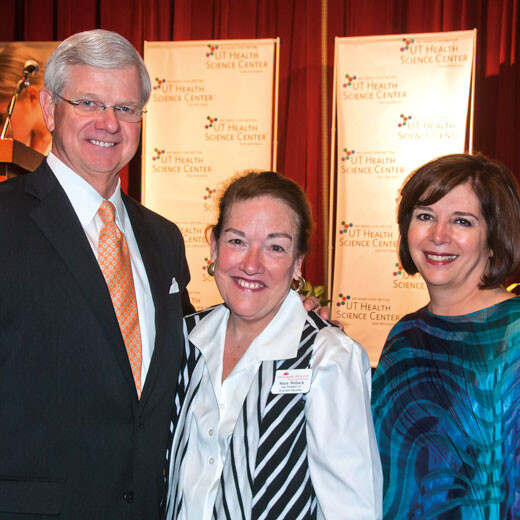 (Left to right) Nursing Advisory Committee Chair Gregg Muenster stands with keynote speaker Maria Wellisch, RN, B.B.A., LNFA, and School of Nursing Dean Eileen T. Breslin, Ph.D., RN, FAAN.