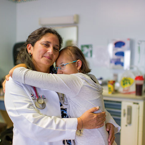 Dr. Shah hugs Samantha Alvarez