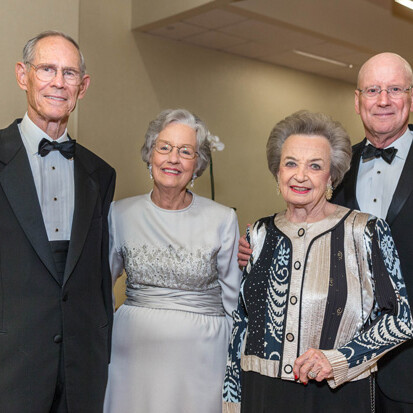President William L. Henrich, M.D., MACP, recognizes Bartell and Mollie Zachry and Ann Biggs at the President’s Gala Sept. 26.