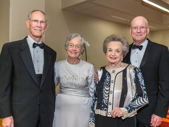 President William L. Henrich, M.D., MACP, recognizes Bartell and Mollie Zachry and Ann Biggs at the President’s Gala Sept. 26.