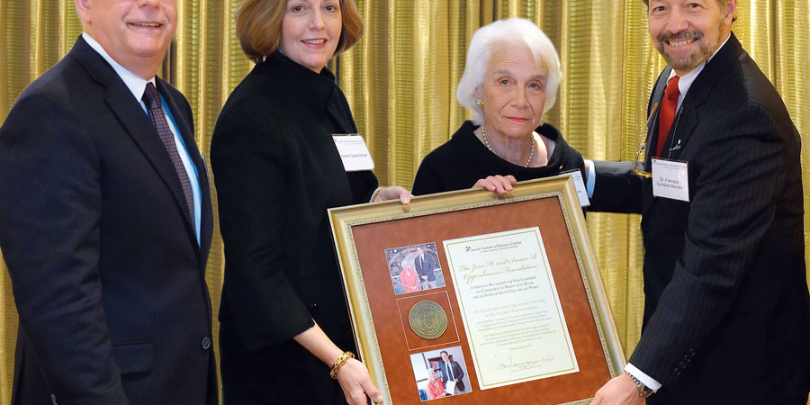 (Pictured above) Francisco González-Scarano, M.D., dean of the Long School of Medicine and vice president for medical affairs (right), presents Susan R. Oppenheimer (center) with a plaque of appreciation for her dedicated support.
