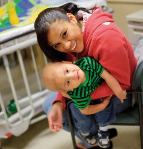 Sierra Garza enjoys a quiet moment with her 22 -month-old son, Haistin Sky, as he wakes up after his leukemia treatment at the CTRC.
