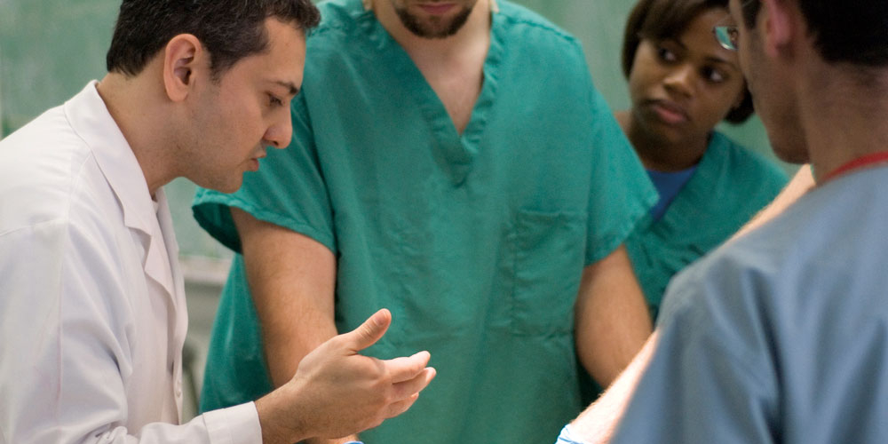 (Photo left) Omid Rahimi, Ph.D., assistant professor of cellular and structural biology (left). directs the Human Anatomy Program at the UT Health Science Center.