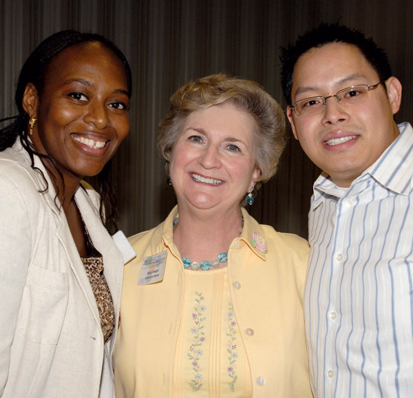 Students Amy Lindsey (left) and Frank Le thank Mary Brogan, Baptist Health Foundation trustee and Scholarship Committee chair, during a luncheon honoring the Foundation for its support.