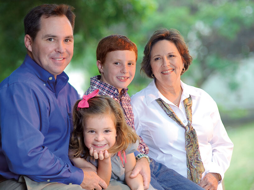After participating in the GRACE project, Susan Bell (right) said she better understands the importance of knowing her family’s health history. She said she’ll share it with her relatives, including her son Kevin Bell (far left), granddaughter Sadie, 6, and grandson Adam, 8.