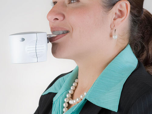 An earlier model of the AcceleDent is the device used in the current Health Science Center study. Denice Jimenez, an Orthodontic Clinic patient, demonstrates how the AcceleDent device is used.