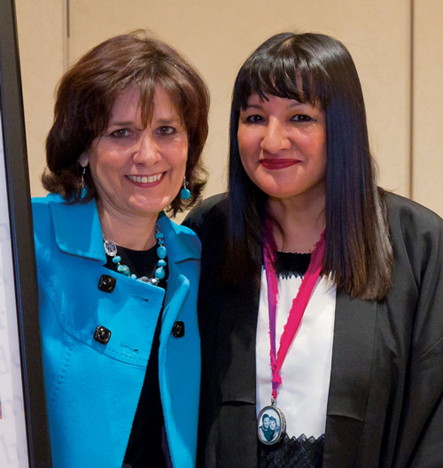 Graciela Cigarroa (left), wife of UT System Chancellor Francisco G. Cigarroa, M.D., meets author Sandra Cisneros at last year’s Book & Author Luncheon.