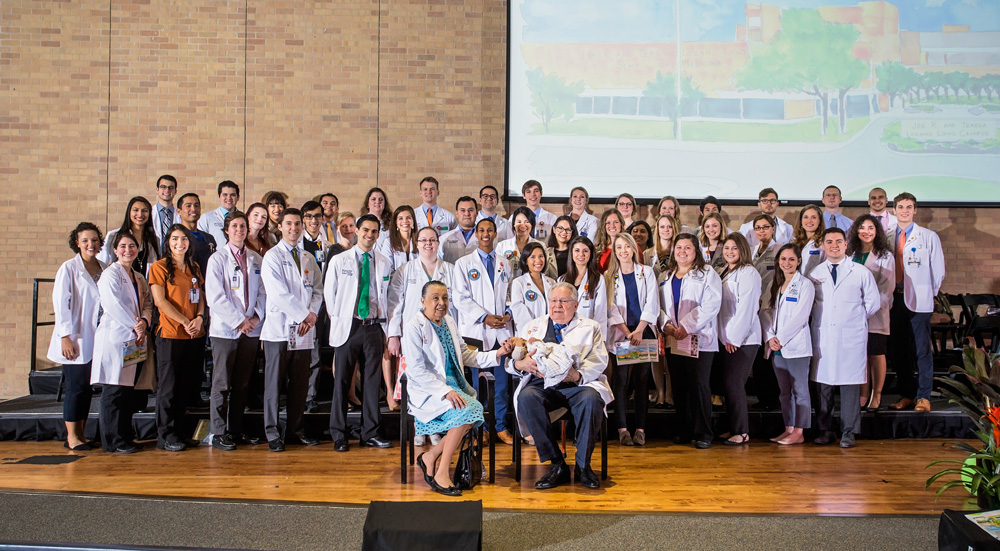 Austin philanthropists Joe R. and Teresa Lozano Long with scholarship recipients