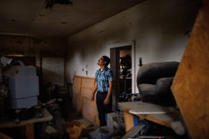 Joel Torres, M.D., stands in his childhood home