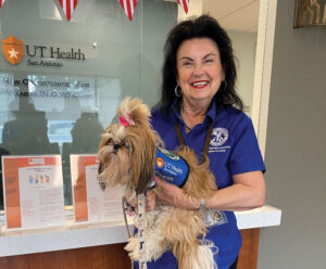 therapy dog with her owner