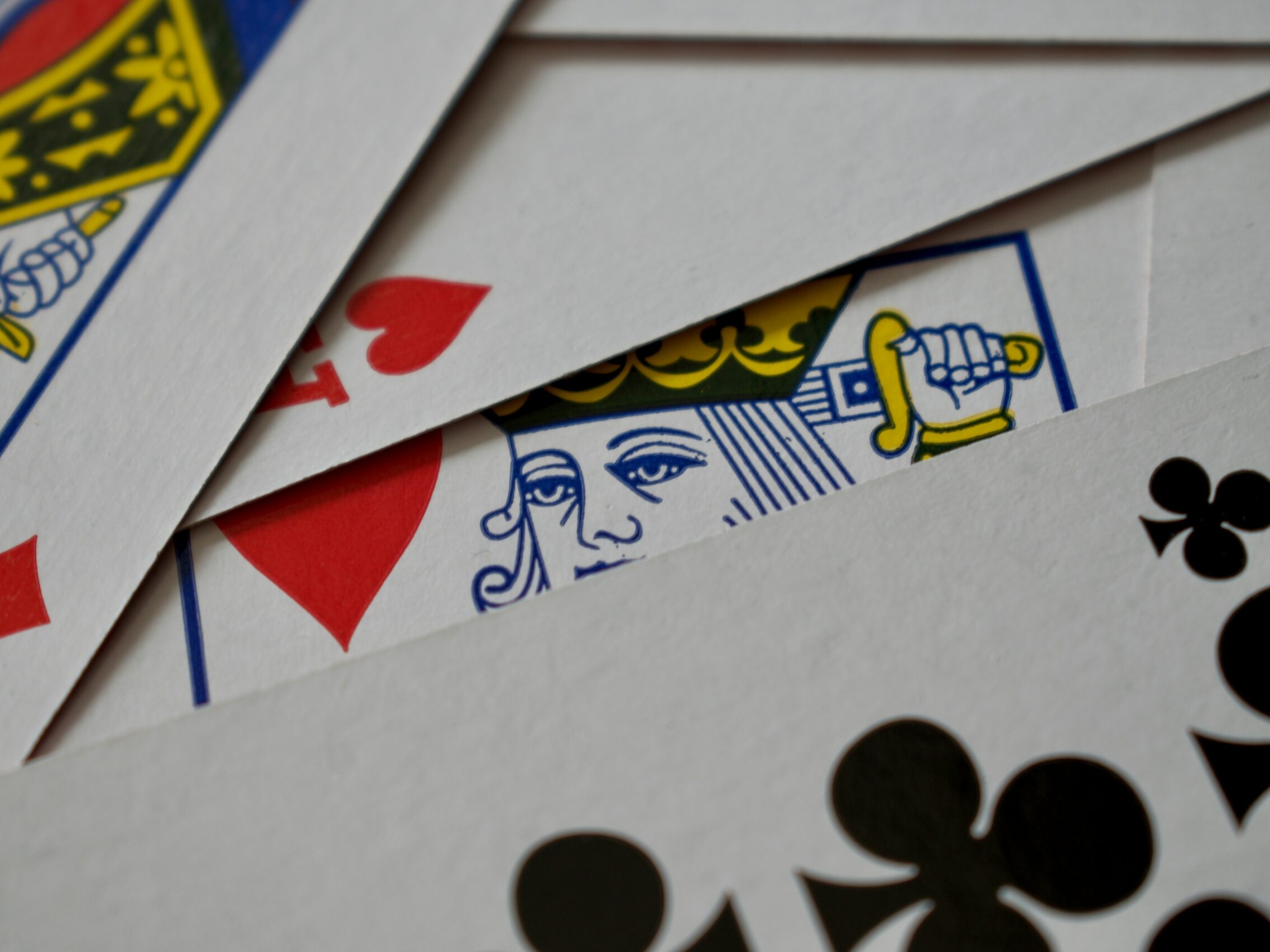 Stock photo of a deck of cards all thrown and out of order.