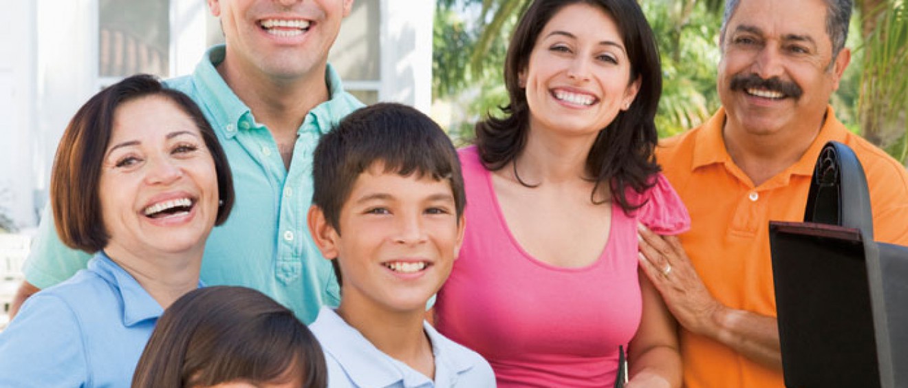Hispanic family having a BBQ.