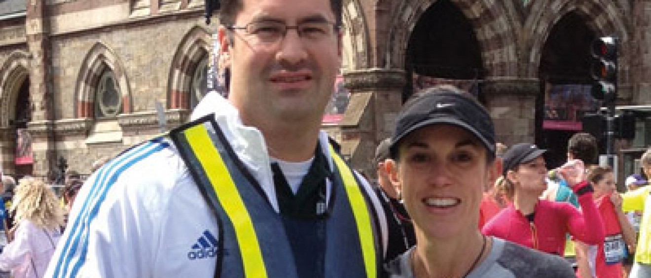 Alumnus Jorge A. Alvarez, M.D., congratulates his wife, Rebecca, after she crosses the Boston Marathon finish line. Despite the shock of the tragedy that occurred thereafter, Dr. Alvarez took immediate action to help the injured.