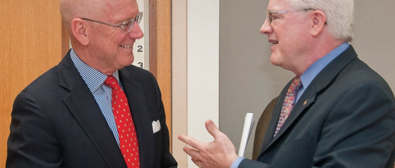 Dr. Henrich thanks Kevin C. Moriarty (right), president and chief executive officer of Methodist Healthcare Ministries