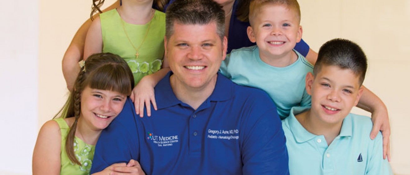 Gregory Aune, M.D., Ph.D., is pictured with his wife, Christine Aune, M.D., and his children: 10-year-old twins Emma and Noah (seated) and 5-year-old twins Sophia and Elijah (standing).