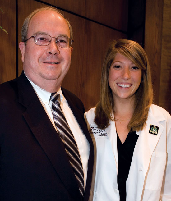 Will O’Hara congratulates Melissa Minor, a first-year medical student, at the Long School of Medicine’s 2008 White Coat ceremony. Minor was one of O’Hara’s former students.