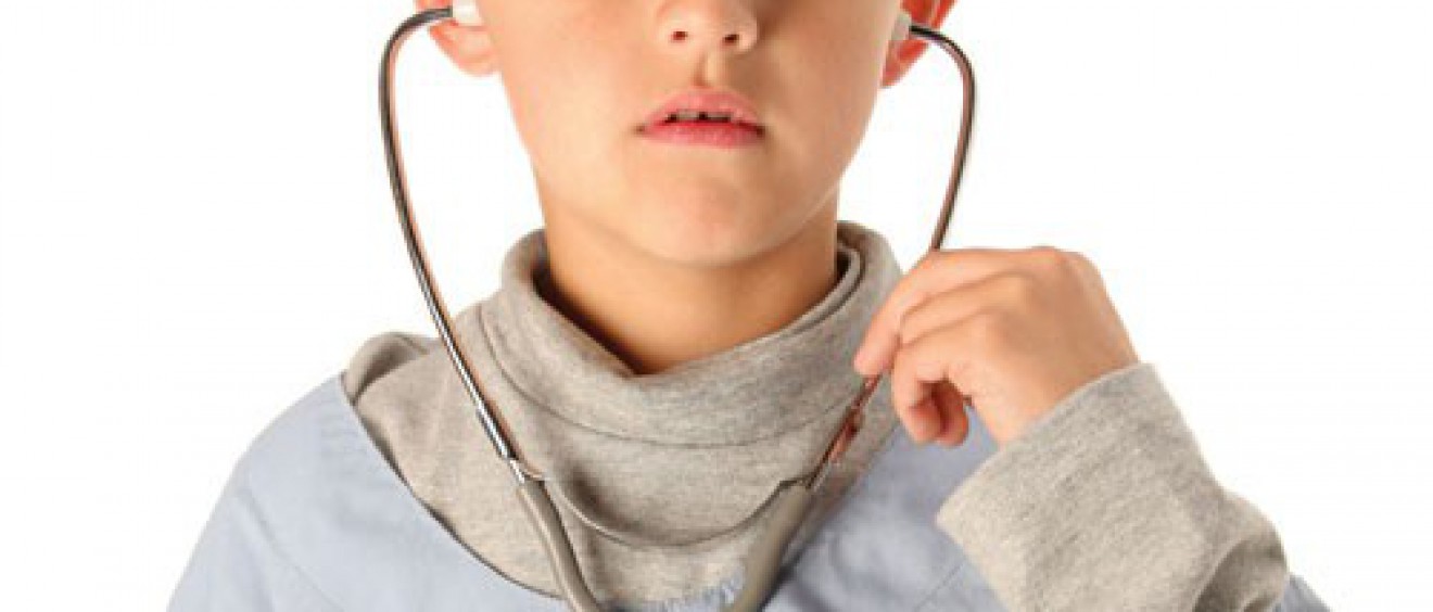 Boy playing with stethoscope