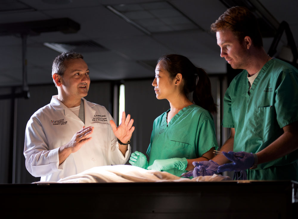 Omid Rahimi, Ph.D. discusses the intricacies of the human body with teaching assistants