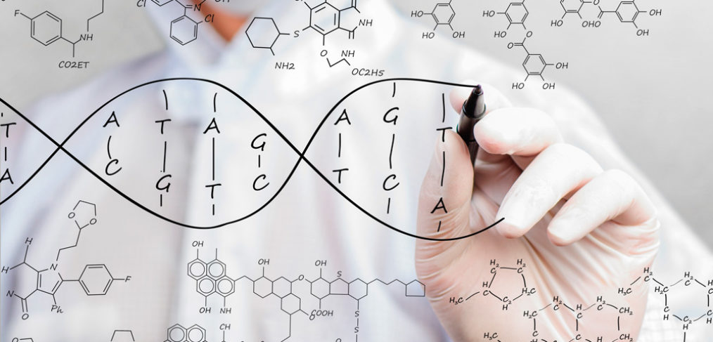 researcher writing DNA code.