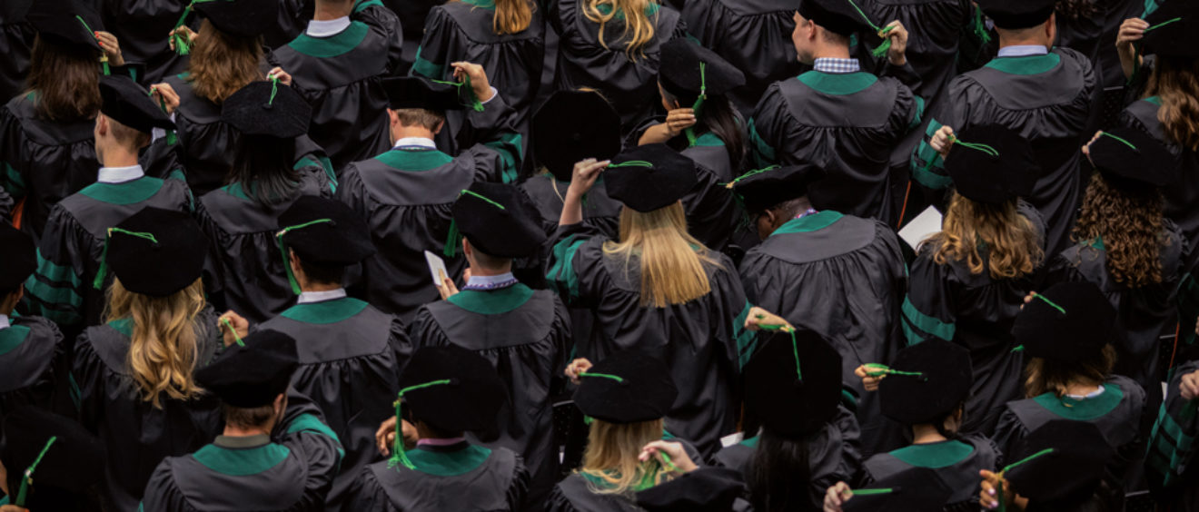 graduates at commencement