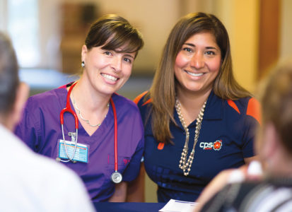 Nursing student Darinka Hudson (left), works with Sonia Moreno Rogers of CPS Energy, to inform San Antonians about available resources to help ensure their home health and safety.
