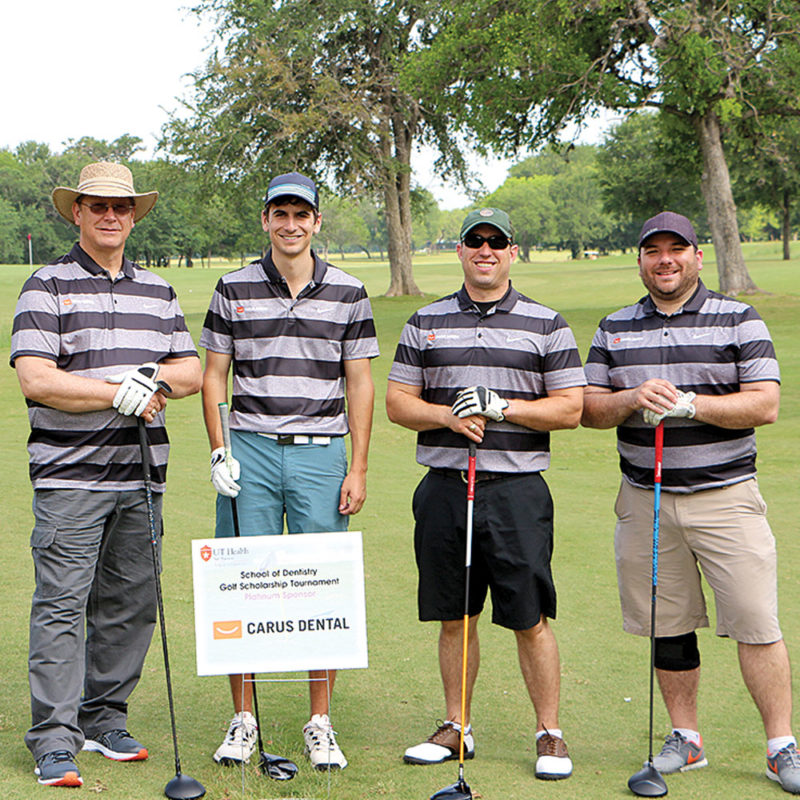 Ray Scott, D.D.S., Class of 1983 (from left); Kyle Gross, dental student/"ringer"; Danny Richter and Ryan Blair made up the Carus Dental golf team.