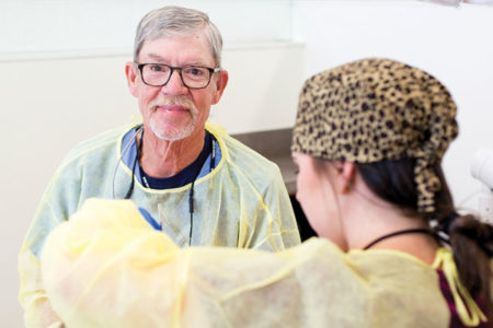 Barry W. Holleron, D.D.S., clinical professor of comprehensive dentistry, enjoys teaching junior and senior dental students.