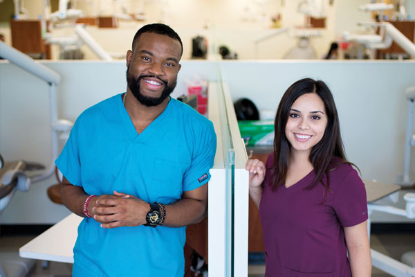 Devon Harris, fourth-year dental student, and Hevony Rodriguez, third-year dental student, are among the initial recipients of Scholarships for Disadvantaged Students.
