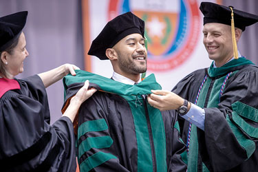 Oliver Batiste and Andrew Muck, M.D.