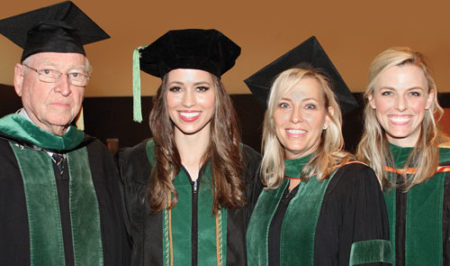 At the school’s 2017 graduation, Jim L. Story (from left), M.D., founding faculty member; granddaughter Heidi Held McDonald, M.D., Class of 2017; daughter Kristin Story Held, M.D., Class of 1985; and granddaughter Holly Held Volz, M.D., Class of 2014, celebrate three generations and three graduations at the Long School of Medicine.