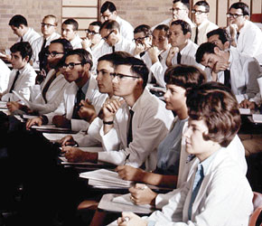 Students listen to a professor during a class in the medical school in the 70s.
