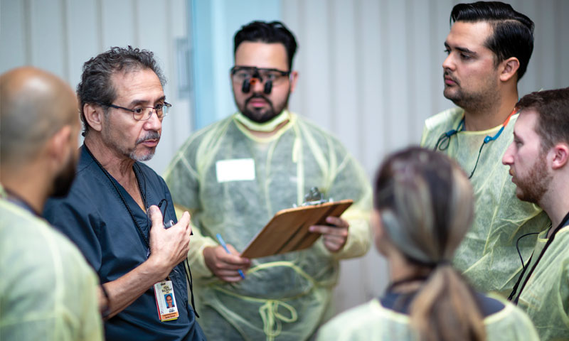 Vidal G. Balderas, D.D.S., M.P.H. discusses patient cases with students