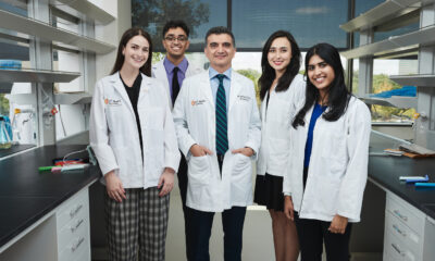 Ali Seifi, MD (center), with MS graduate students (from left to right) Alexis Lorio (Class of 2024), Hari Krishnakumar (Class of 2024), Ellen Burton (Class of 2024) and Shwetha Menon (Class of 2023) standing in Seifi's lab.